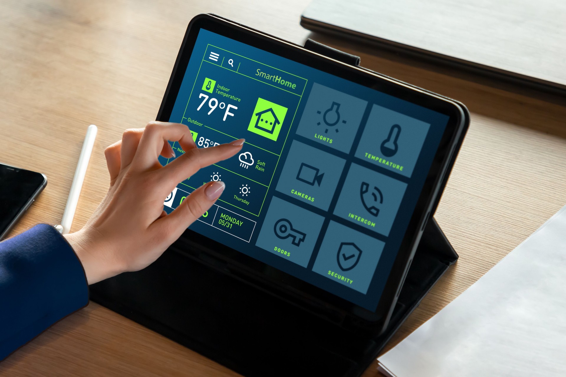 Woman Using Tablet with Smart Home App Displaying Temperature in Fahrenheit